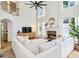 Spacious living room featuring a fireplace, high ceilings, hardwood floors, and large windows at 2200 Major Loring Sw Way, Marietta, GA 30064