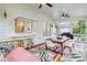 Cozy screened porch with bar seating, dining table, and comfortable lounge area perfect for outdoor relaxation at 2200 Major Loring Sw Way, Marietta, GA 30064