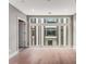 Spacious bedroom with hardwood floors and natural light from a large window at 1099 North Ne Ave # 13, Atlanta, GA 30307