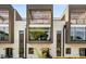 View of townhouses with a modern style, patios and balconies, complimented by beautiful greenery at 1099 North Ne Ave # 13, Atlanta, GA 30307