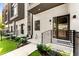 Modern townhome showcasing sleek design, well-manicured lawn, and welcoming front entrance at 1099 North Ne Ave # 13, Atlanta, GA 30307