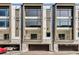 Modern townhome exterior boasting balconies, large windows, and convenient garage parking at 1099 North Ne Ave # 13, Atlanta, GA 30307