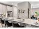 Contemporary kitchen island with stone countertops and seating for three at 1099 North Ne Ave # 13, Atlanta, GA 30307