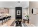 Cozy living room featuring a fireplace, modern furniture, and access to the kitchen at 1099 North Ne Ave # 13, Atlanta, GA 30307
