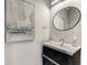Modern powder room featuring vanity sink with contemporary fixtures and abstract artwork at 1099 North Ne Ave # 13, Atlanta, GA 30307