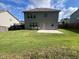 Spacious backyard featuring a well-maintained lawn and a concrete patio, perfect for outdoor enjoyment at 239 Lenore Ct, Hiram, GA 30141