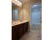 Bathroom featuring double sinks with tile floors at 239 Lenore Ct, Hiram, GA 30141