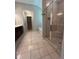 Bathroom featuring a large walk-in shower, separate tub and dual vanity sinks at 239 Lenore Ct, Hiram, GA 30141
