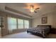 Bright bedroom features a ceiling fan, carpet floors and natural light at 239 Lenore Ct, Hiram, GA 30141