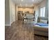Open-concept view of kitchen and dinette, stainless steel appliances, bright windows at 239 Lenore Ct, Hiram, GA 30141