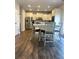 Bright kitchen with stainless steel appliances and a dining table; perfect for casual meals and Gathering gatherings at 239 Lenore Ct, Hiram, GA 30141