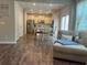 Bright kitchen and dinette area with stainless appliances, wooden floors, and lots of natural light at 239 Lenore Ct, Hiram, GA 30141