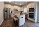 Well-equipped kitchen featuring stainless steel appliances, a central island with seating, and ample counter space at 239 Lenore Ct, Hiram, GA 30141