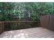 Wooden back deck overlooking a private wooded area at 734 Celeste Sw Ln # 84, Atlanta, GA 30331