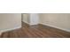 Unfurnished bedroom with hardwood floors and a closet at 734 Celeste Sw Ln # 84, Atlanta, GA 30331
