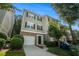 Charming townhome with brick accents, attached garage, manicured landscaping, and inviting front entrance at 734 Celeste Sw Ln # 84, Atlanta, GA 30331