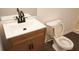 Half bathroom featuring a new vanity and toilet at 11854 Registry Blvd, Hampton, GA 30228