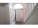 Bright foyer with hardwood floors and stairway at 11854 Registry Blvd, Hampton, GA 30228