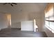 Living room with vaulted ceiling and hardwood floors at 11854 Registry Blvd, Hampton, GA 30228