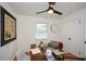 Bright home office featuring a wooden desk, neutral-toned furniture, and natural light at 1048 Pinehurst Se Dr, Smyrna, GA 30080