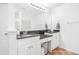 Bathroom featuring double sinks and granite countertops at 2100 Lily Valley Dr, Lawrenceville, GA 30045