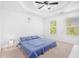 Spacious bedroom with tray ceiling and plenty of natural light at 2100 Lily Valley Dr, Lawrenceville, GA 30045