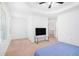 Bedroom with a ceiling fan, and a door to another room in the distance at 2100 Lily Valley Dr, Lawrenceville, GA 30045