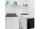 Laundry room equipped with modern washer and dryer units, providing convenience and efficiency at 2100 Lily Valley Dr, Lawrenceville, GA 30045