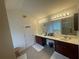 Bathroom featuring double vanity, tile floors, and a spacious layout at 2545 Melville Pl, Powder Springs, GA 30127