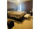 Bedroom featuring a bed and carpeted flooring at 2545 Melville Pl, Powder Springs, GA 30127
