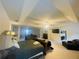 Spacious main bedroom featuring sitting area, ceiling fan and carpeted flooring at 2545 Melville Pl, Powder Springs, GA 30127