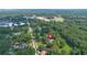A home surrounded by lush trees and is near shopping, schools, and downtown at 357 W Hightower Trl, Social Circle, GA 30025