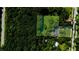 Expansive lot with mature trees surrounding the home, offering privacy and a serene environment at 357 W Hightower Trl, Social Circle, GA 30025