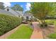 Backyard featuring a bridge and brick pathway at 357 W Hightower Trl, Social Circle, GA 30025