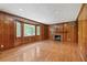 Bright living room boasts hardwood floors, a fireplace, and large bay windows providing ample natural light at 357 W Hightower Trl, Social Circle, GA 30025