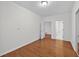 Bedroom with hardwood floors, two closets, and an ensuite bathroom at 2000 Stockton Walk Ln, Snellville, GA 30078