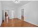 Bedroom features hardwood floors, two closets, and access to the kitchen and bathroom at 2000 Stockton Walk Ln, Snellville, GA 30078