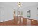 Spacious living room with hardwood floors, natural light, and open flow to the kitchen at 2000 Stockton Walk Ln, Snellville, GA 30078