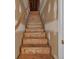 Unfinished staircase with wooden steps at 2000 Stockton Walk Ln, Snellville, GA 30078