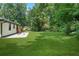 Expansive backyard with lush green lawn, ideal for recreation and relaxation, with space for entertaining at 4291 Lamar Street St, Decatur, GA 30035