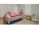 Basement bedroom with a bed, three doors, carpet and painted brick at 4291 Lamar Street St, Decatur, GA 30035