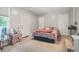 Bedroom with neutral walls, carpet flooring, three doors, and a window at 4291 Lamar Street St, Decatur, GA 30035