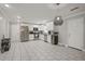 Spacious open concept kitchen with stainless steel appliances and ceramic tile flooring at 4291 Lamar Street St, Decatur, GA 30035