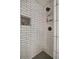 Modern tiled shower with a built-in niche and sleek fixtures at 4291 Lamar Street St, Decatur, GA 30035