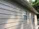 Home exterior showing modern siding and well-maintained windows at 8113 Fieldstream Way, Douglasville, GA 30134