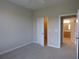 Bedroom with carpet and access to a bathroom at 870 Mayson Turner Nw Rd # 1344, Atlanta, GA 30314