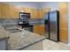 Well-equipped kitchen with stainless steel appliances and granite countertops at 870 Mayson Turner Nw Rd # 1344, Atlanta, GA 30314
