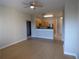 Open-concept living room with modern ceiling fan and an adjacent kitchen area at 870 Mayson Turner Nw Rd # 1344, Atlanta, GA 30314