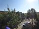 View of the street showcasing trees, street, sky, and vehicles from a high angle perspective at 870 Mayson Turner Nw Rd # 1344, Atlanta, GA 30314