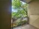 Outdoor balcony with metal railing overlooking lush greenery at 870 Mayson Turner Nw Rd # 1228, Atlanta, GA 30314